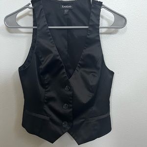 Bebe black vest size 4